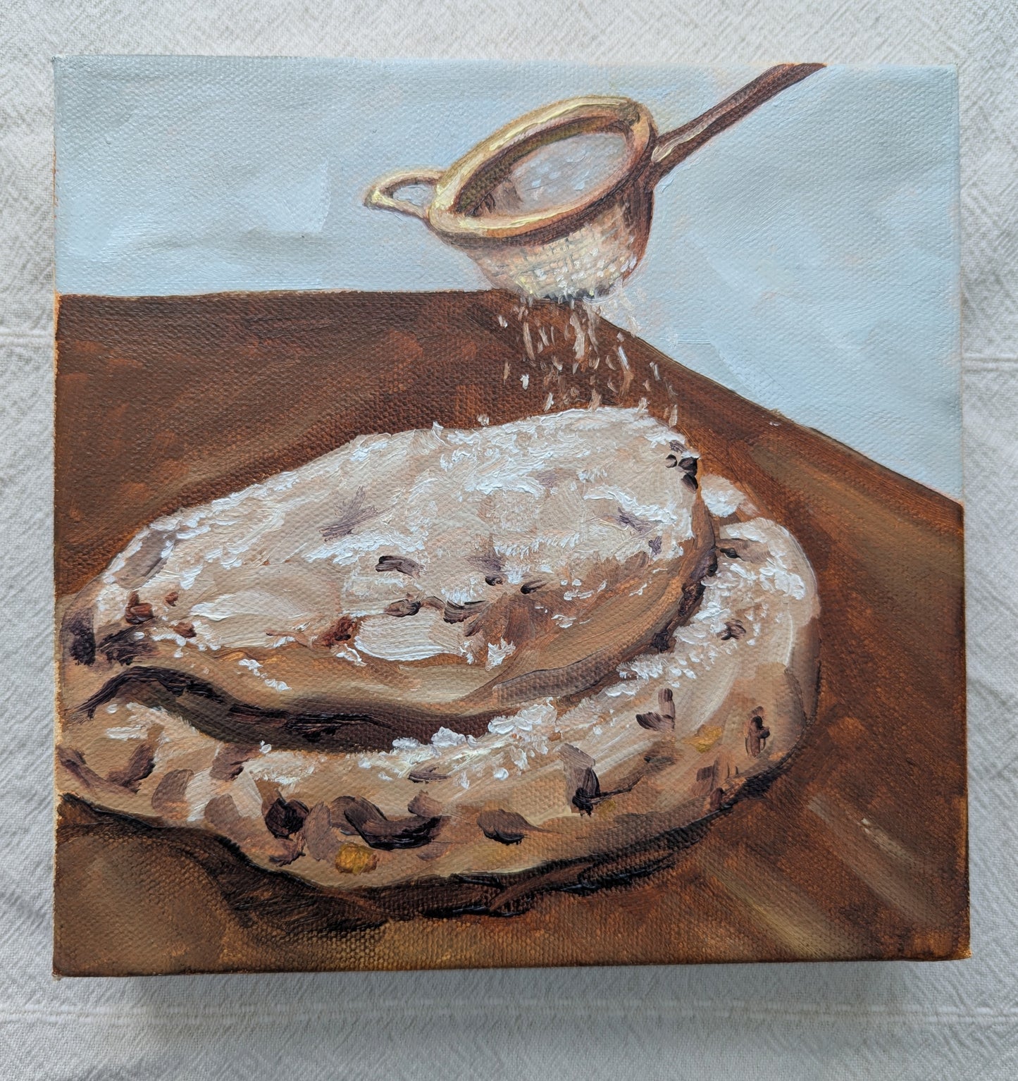 Original oil painting of Christmas stollen bread, 8x8 inches on stretched canvas by Emily Langer